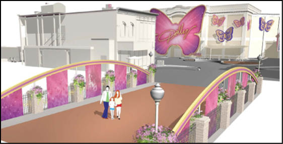 Two people walk on a decorative bridge with pink and purple butterfly-themed panels and banners in an urban setting. Description generated by AI