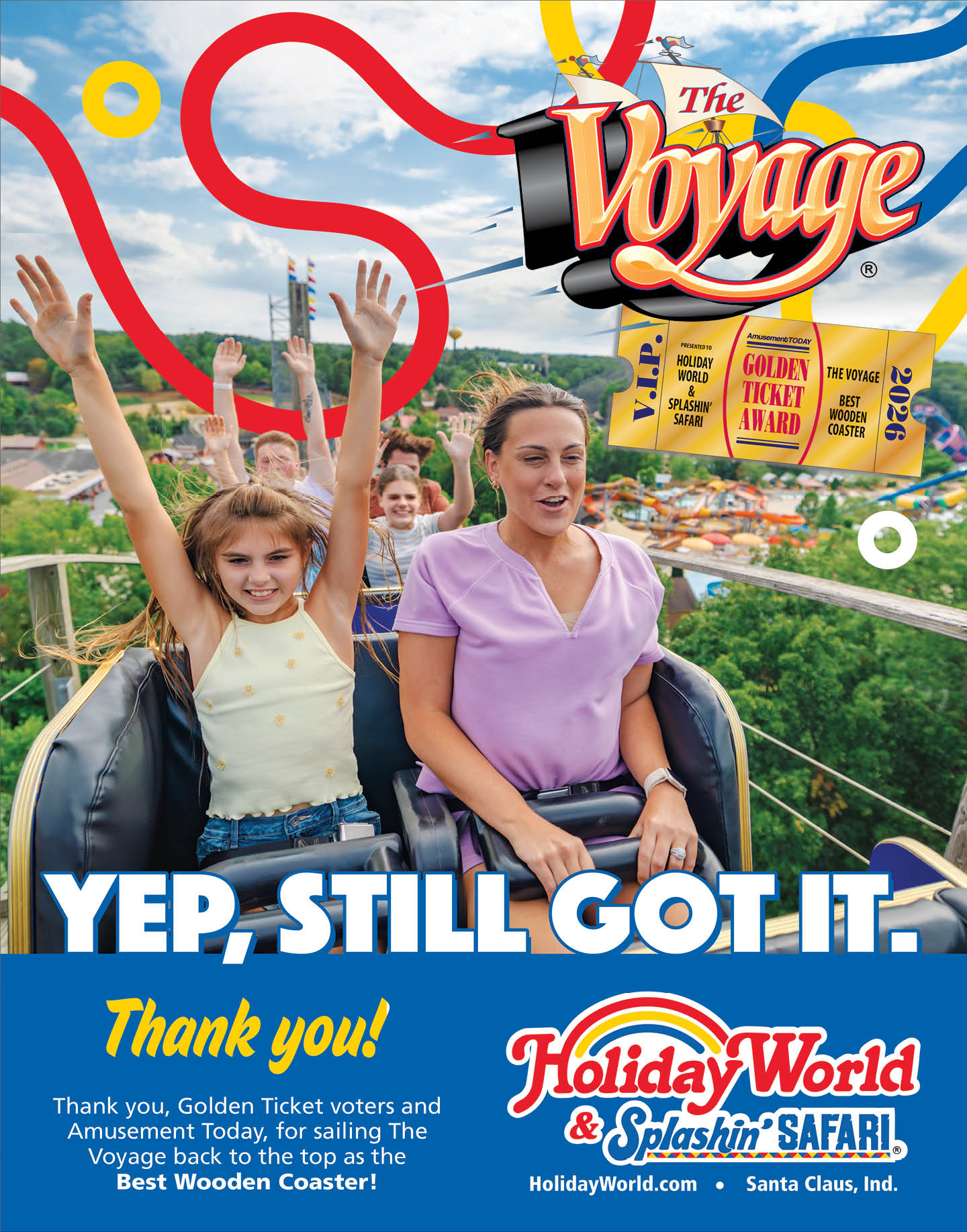 Two people, one with arms raised and smiling and the other holding a safety bar, are riding a roller coaster with a colorful amusement park in the background and promotional text for The Voyage roller coaster at Holiday World. Description generated by AI